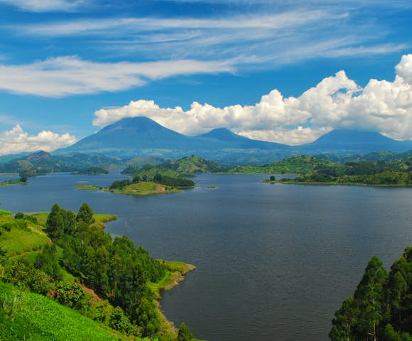 Scenic view of Lake Mutanda and the Virunga Mountains.