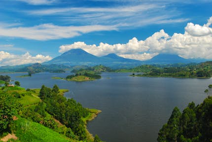 Scenic view of Lake Mutanda and the Virunga Mountains.