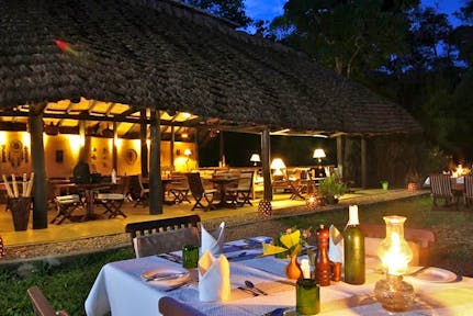 Outdoor dining at Ishasha Wilderness Camp.