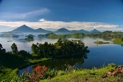 The Virunga Mountain Range is in the background of Lake Mutanda.